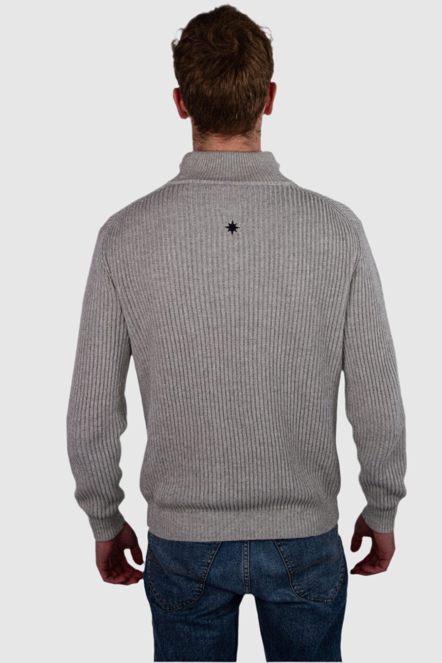 Back view model wearing gray half-zip sweater